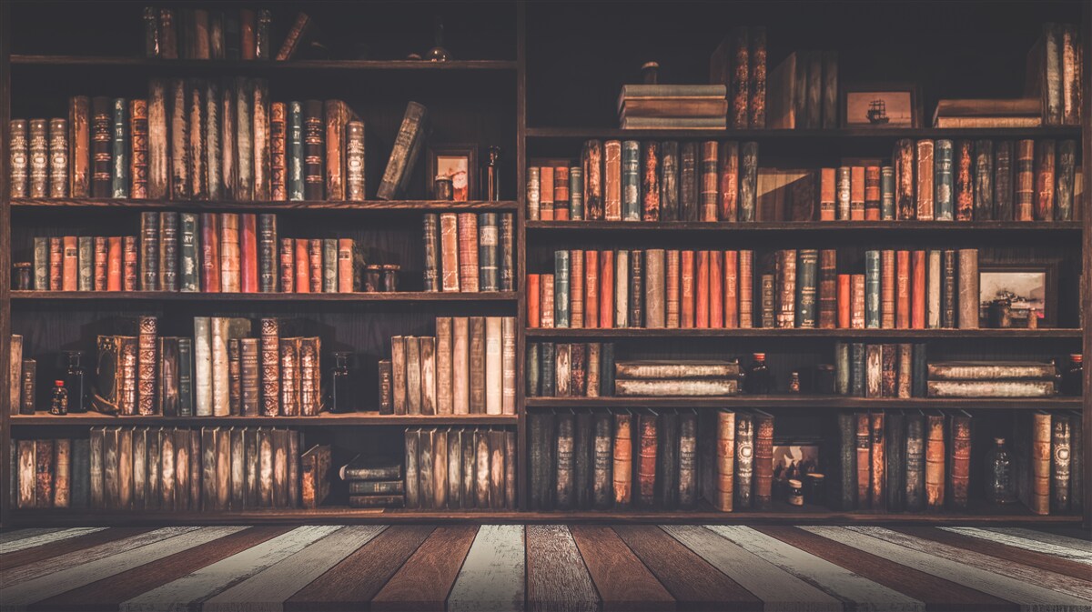 Fotobehang boeken opgestapeld op de planken