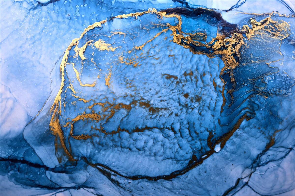 Fotobehang gouden vlekken op een blauwe zee