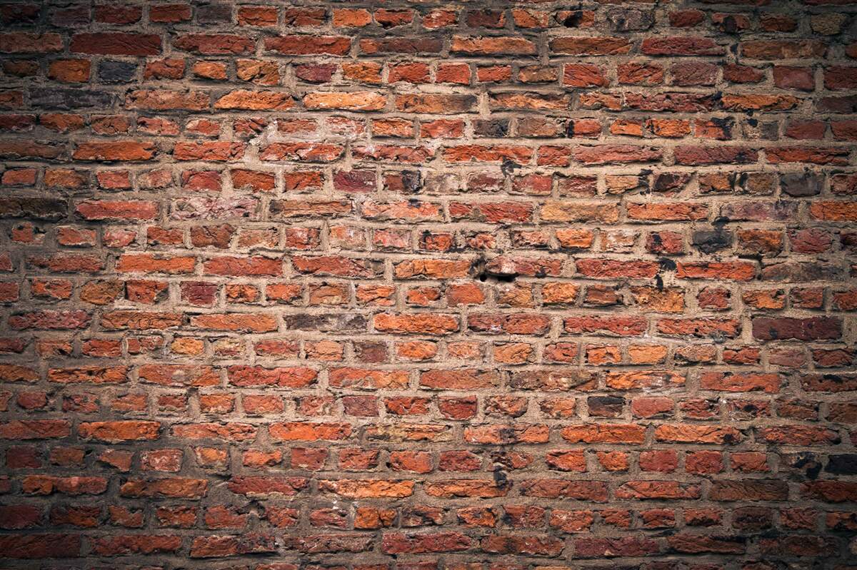 Fotobehang Rode bakstenen muur van het oude gebouw