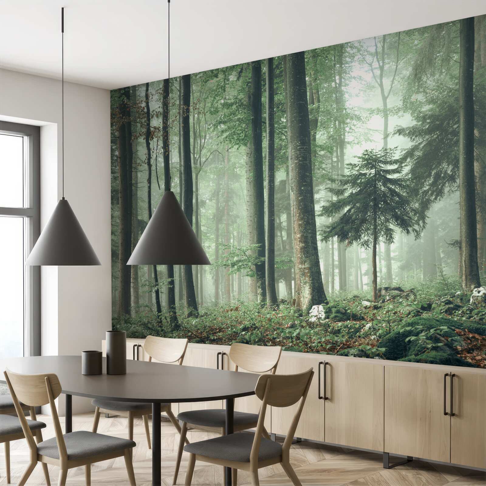 Fotobehang Licht door de mist in een bos van loofbomen
