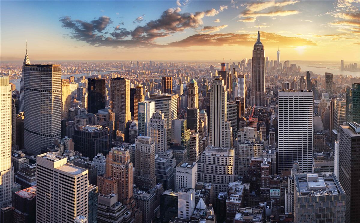 Fotobehang zonsondergang verlicht new york