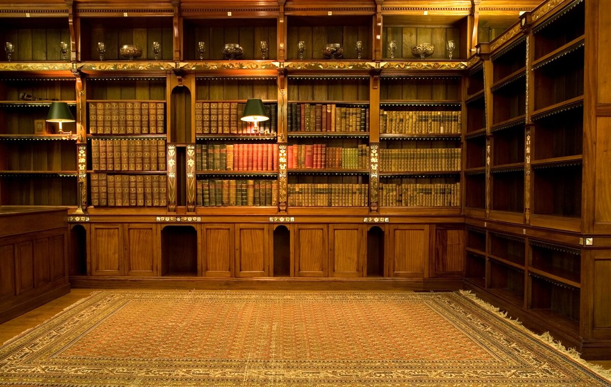 Fotobehang bibliotheek vol oude boeken