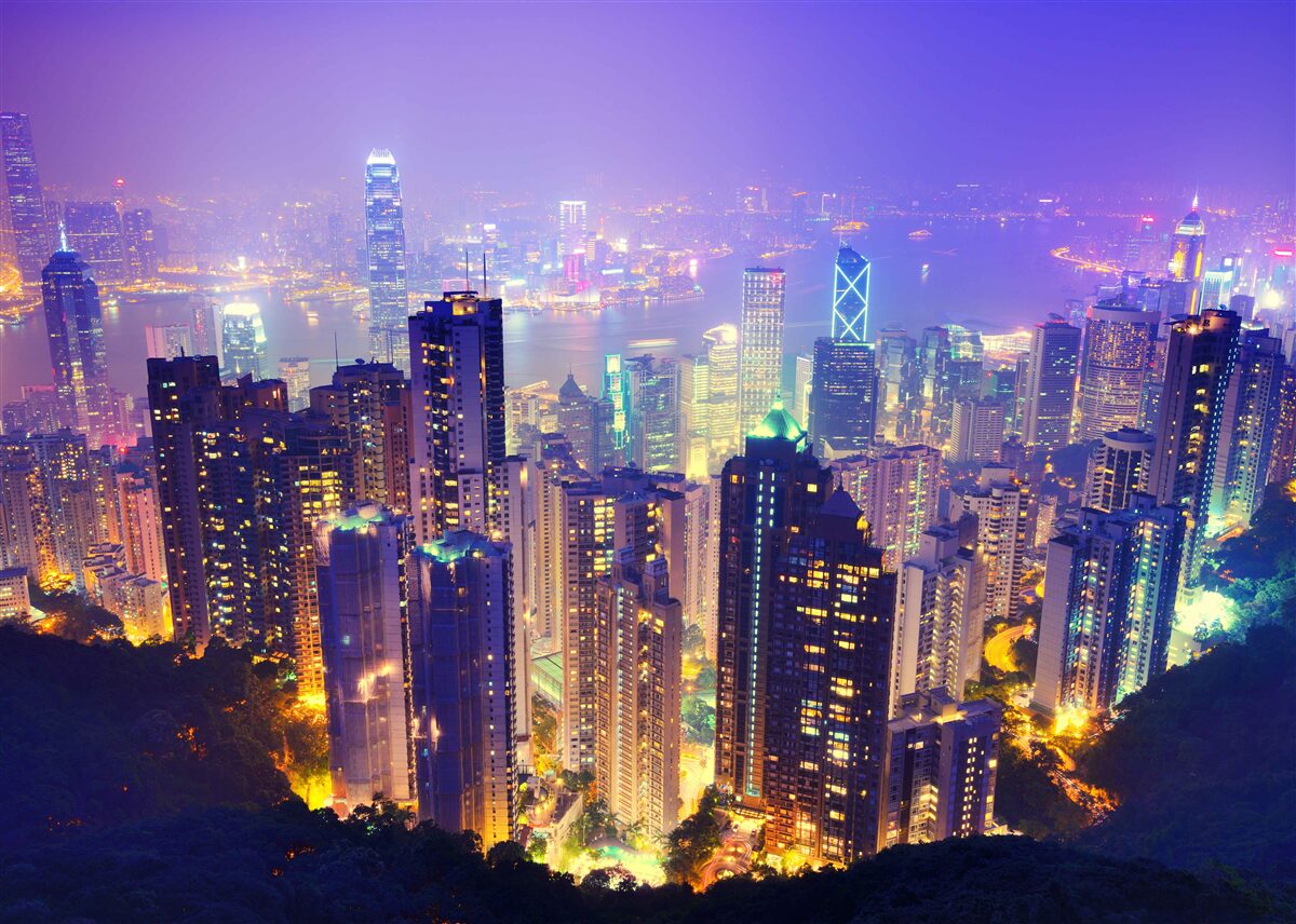 Fotobehang hong kong bij nacht heeft een prachtige skyline