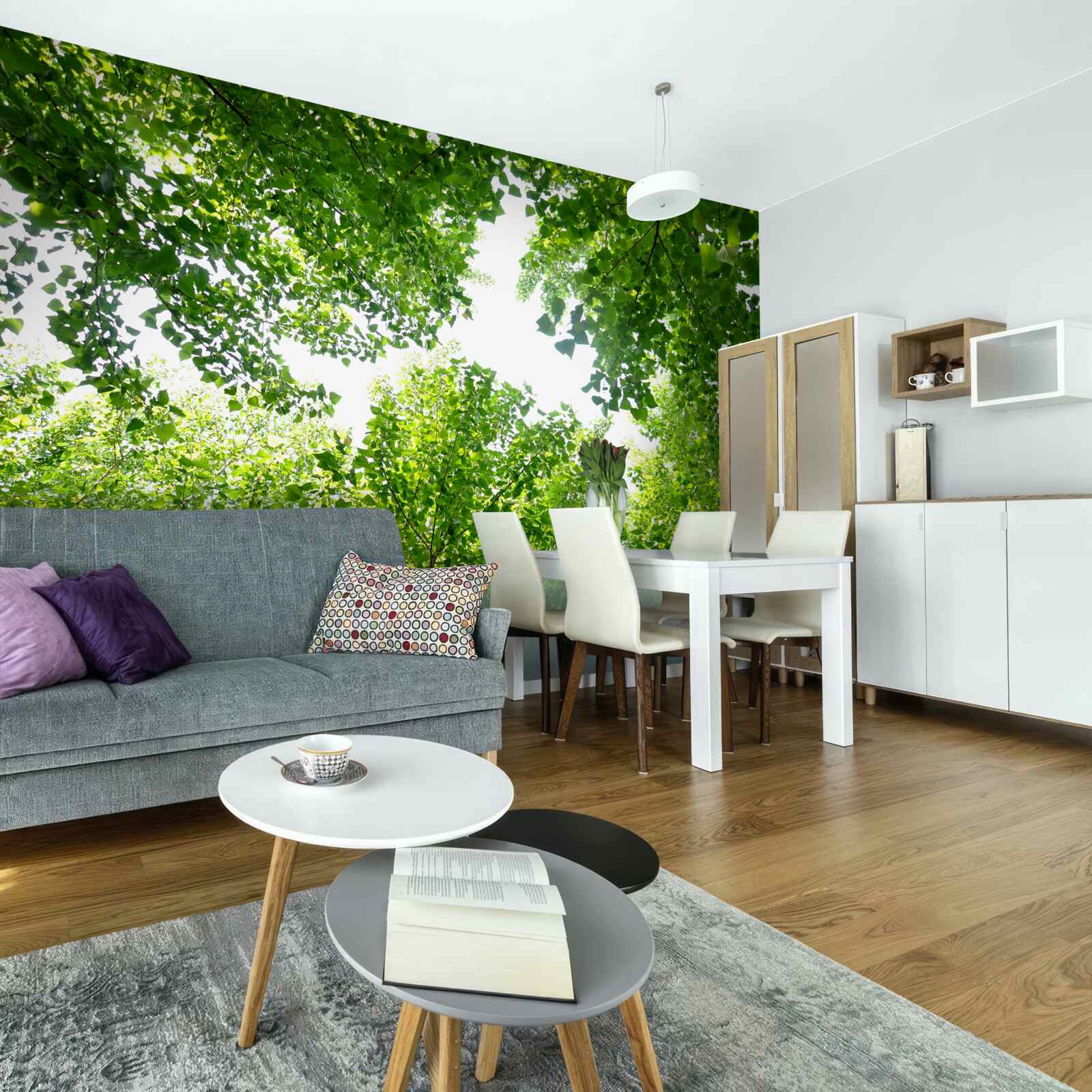 Fotobehang witte lucht met groene bladeren