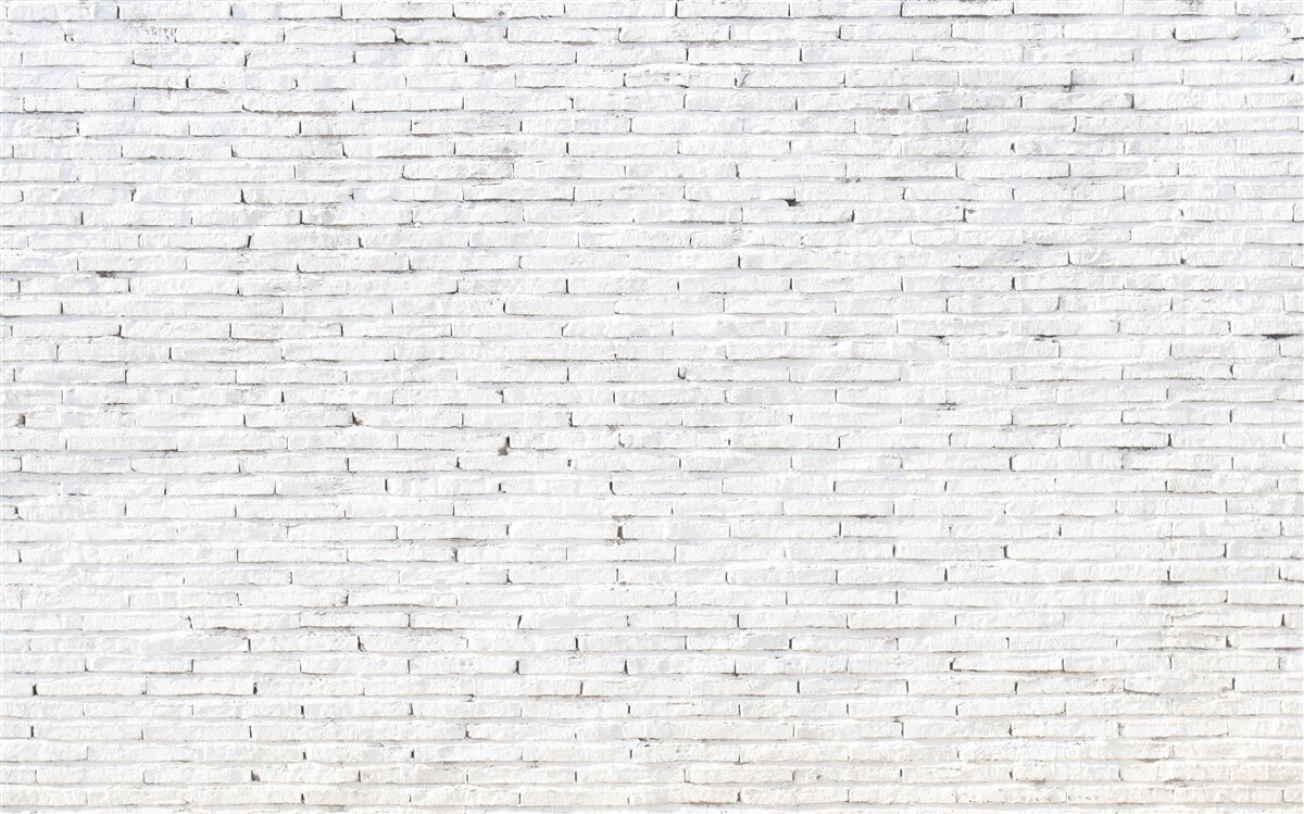 Fotobehang De muur is van baksteen, met een perfecte witte