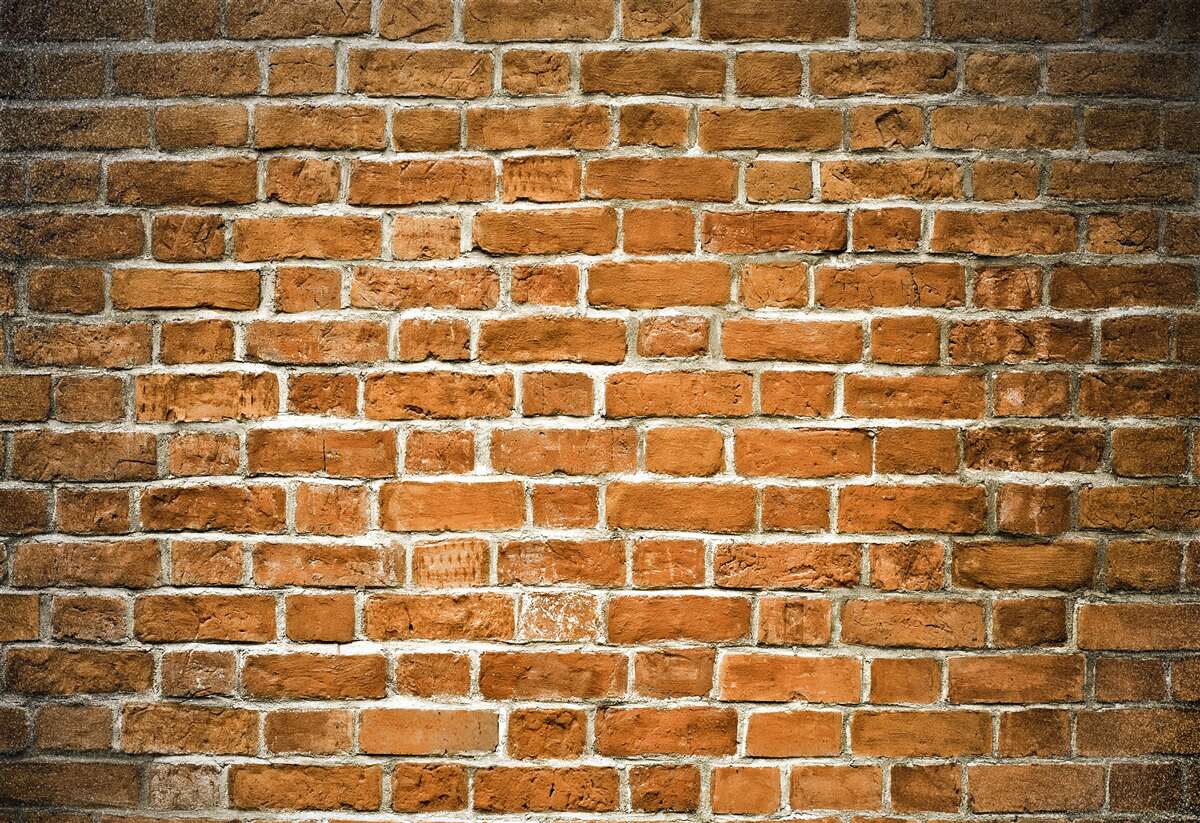 Fotobehang bruine bakstenen muur