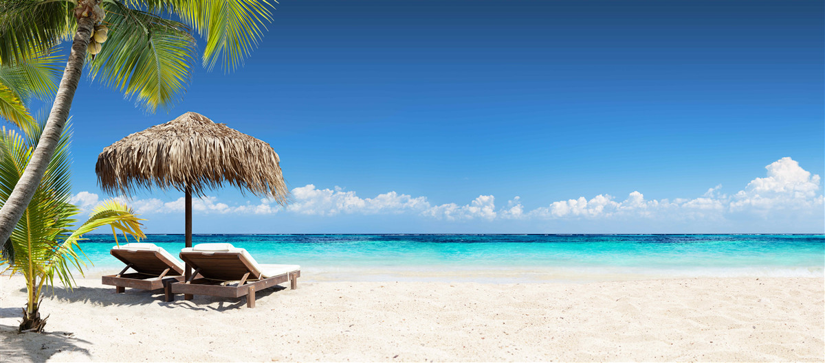 Fotobehang Strandbedden met ligstoelen