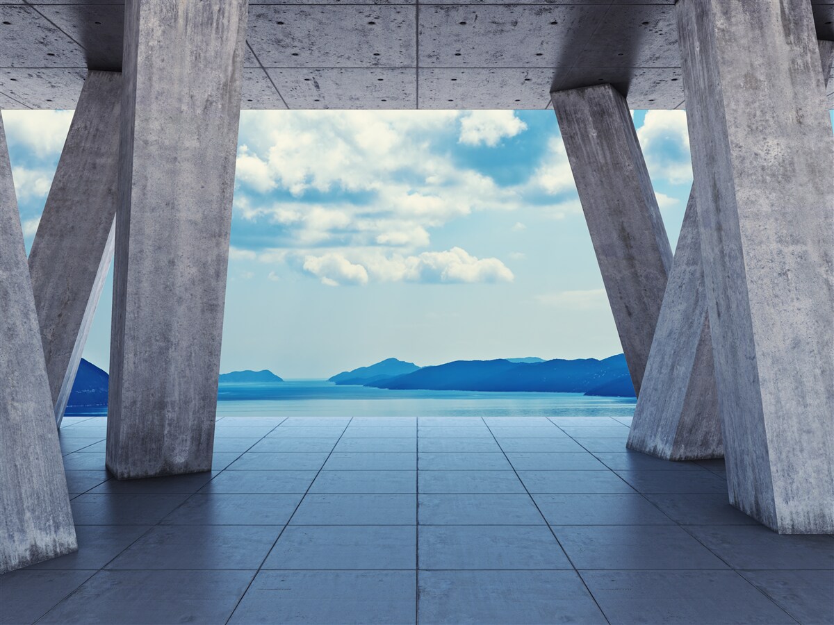 Fotobehang Bogen van beton die een panorama van bergen en lucht openen