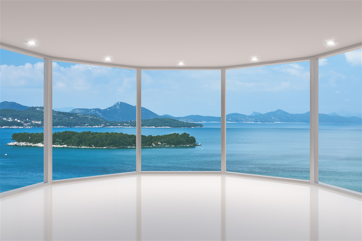 Fotobehang adembenemend panoramisch uitzicht op de oceaan vanuit de ramen