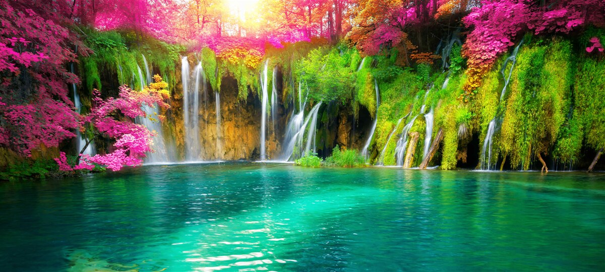 Fotobehang de waterval heeft helder water en ziet eruit als een stukje paradijs