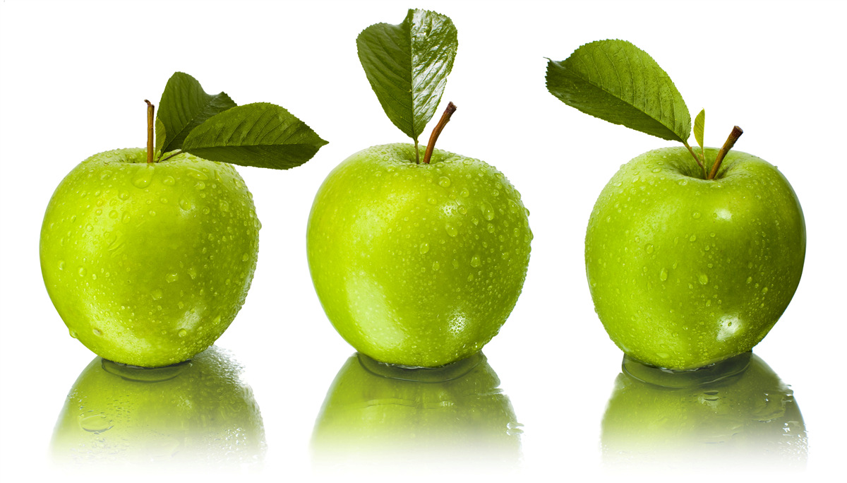 Fotobehang weerspiegeling van groene appels
