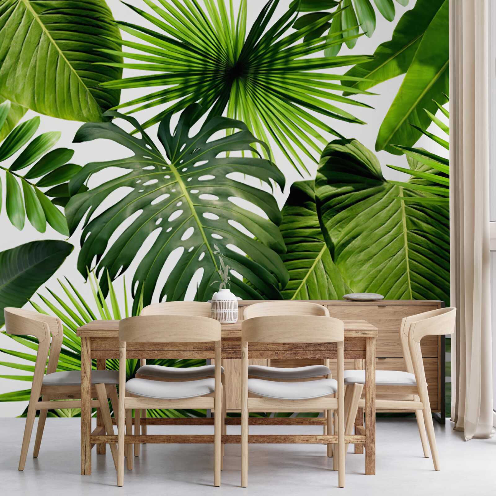 Fotobehang grote groene bladeren van tropische planten