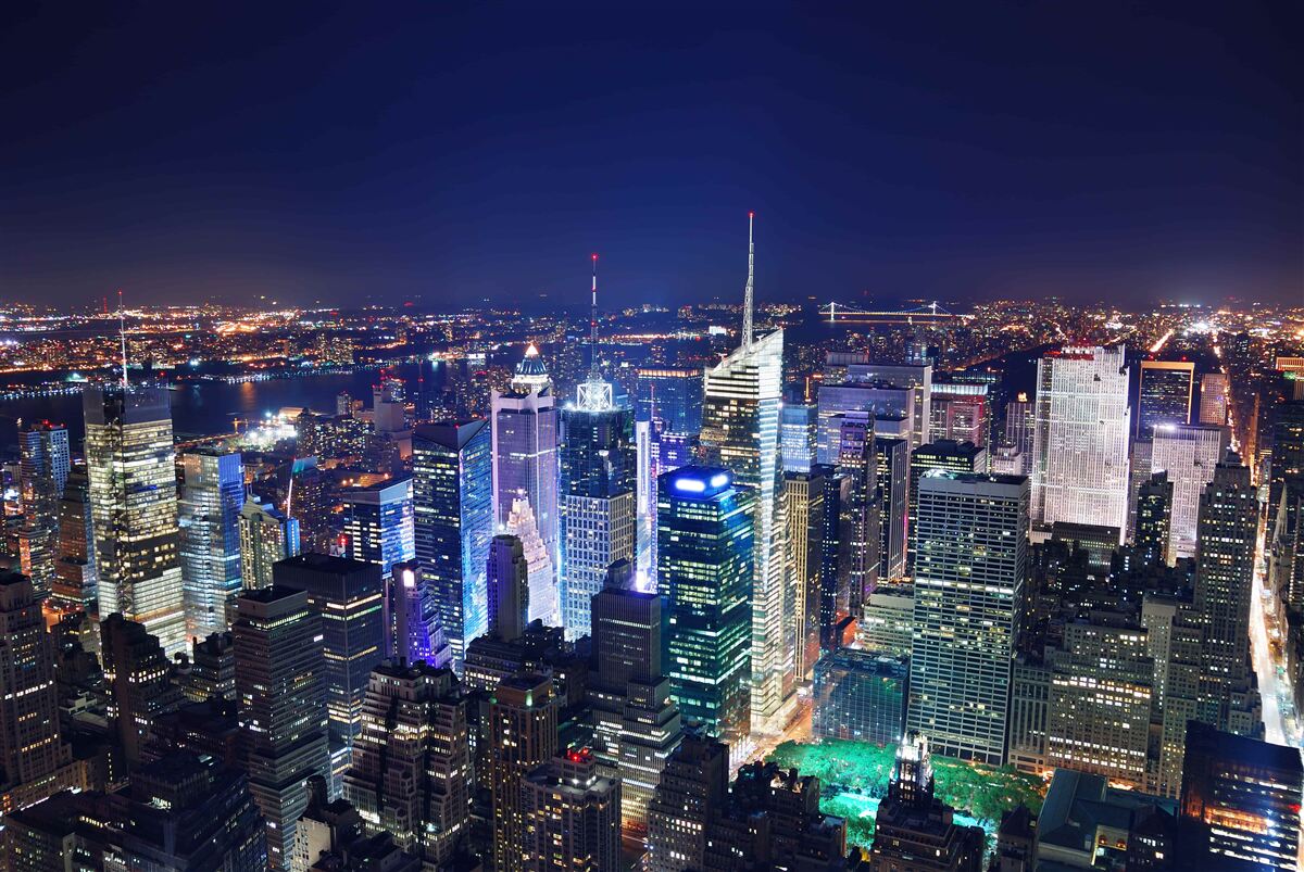 Fotobehang schijnende lichten van de nachtelijke stad