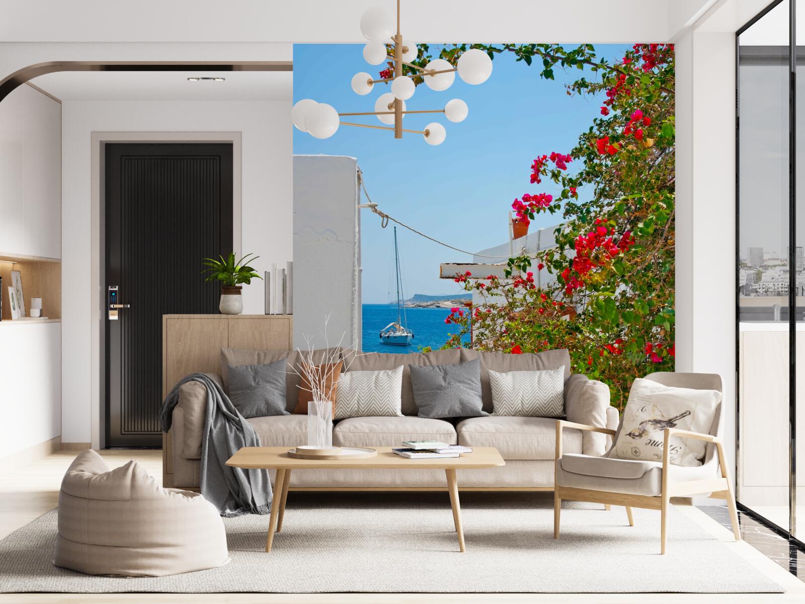 Fotobehang de kleur van rode granaatappel gluurt door de muren van witte huizen