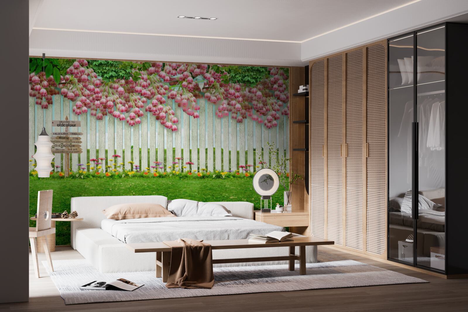 Fotobehang roze bloemen cascade over een wit hek