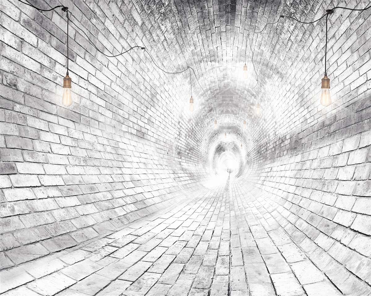 Fotobehang een bakstenen tunnel zonder einde